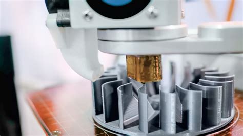 Additive manufacturing and 3D printing .